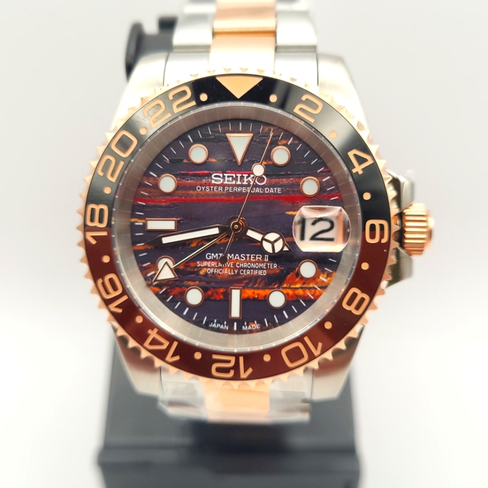 Seiko Two-Tone Rose Gold and Black GMT Watch with Striped Dial